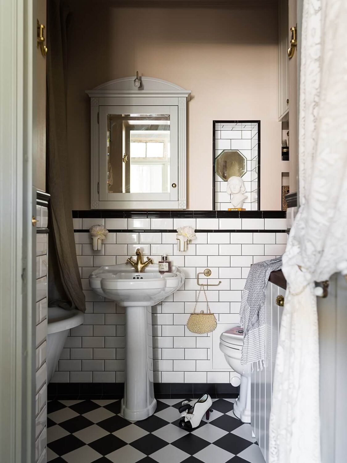 The Top Home Design Trends for 2026: Bold Color, Cozy Corners & Climate-Ready Living 33 bathroom black white tiles soft pink walls