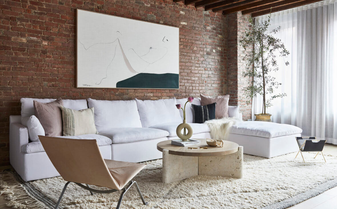 A SoHo Loft with Exposed Brick and Subtle Color Touches 1 soho loft exposed brick nordroom A SoHo Loft with Exposed Brick and Subtle Color Touches