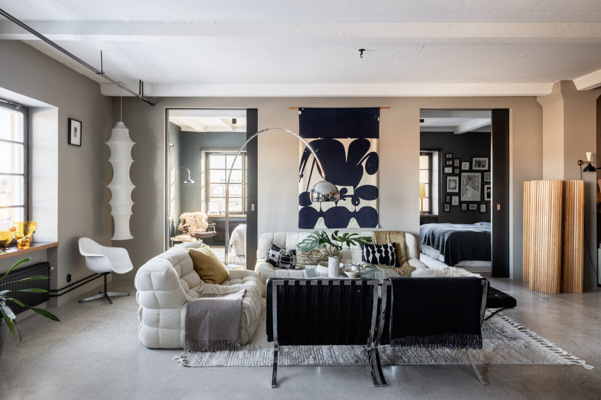 A Monochrome Design Home in a Former Chocolate Factory 3 living room concrete floor large hand-blown windows