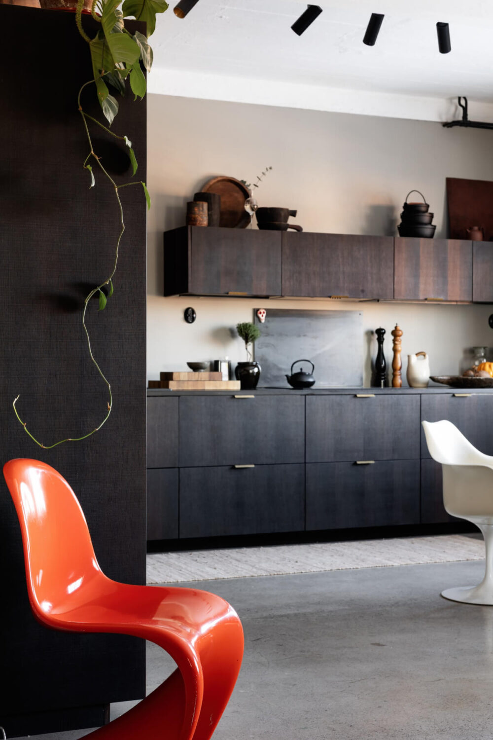 A Monochrome Design Home in a Former Chocolate Factory 6 wood reform cph kitchen orange chair