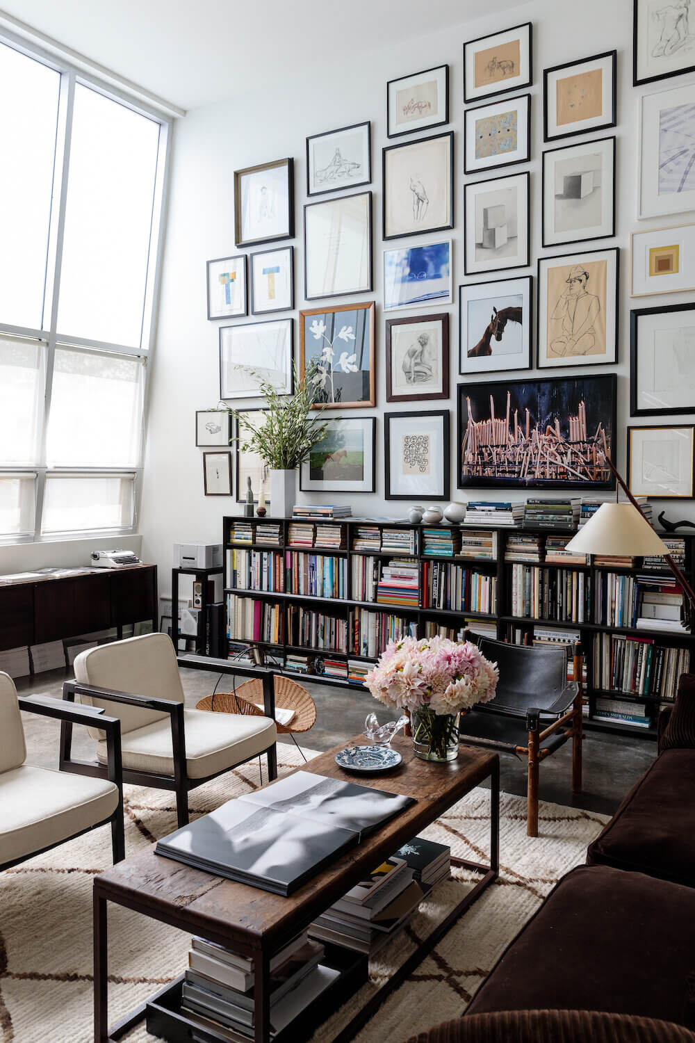 A Light Living Space Filled with Books and Art 2 book filled living room nordroom2 A Light Living Space Filled with Books and Art