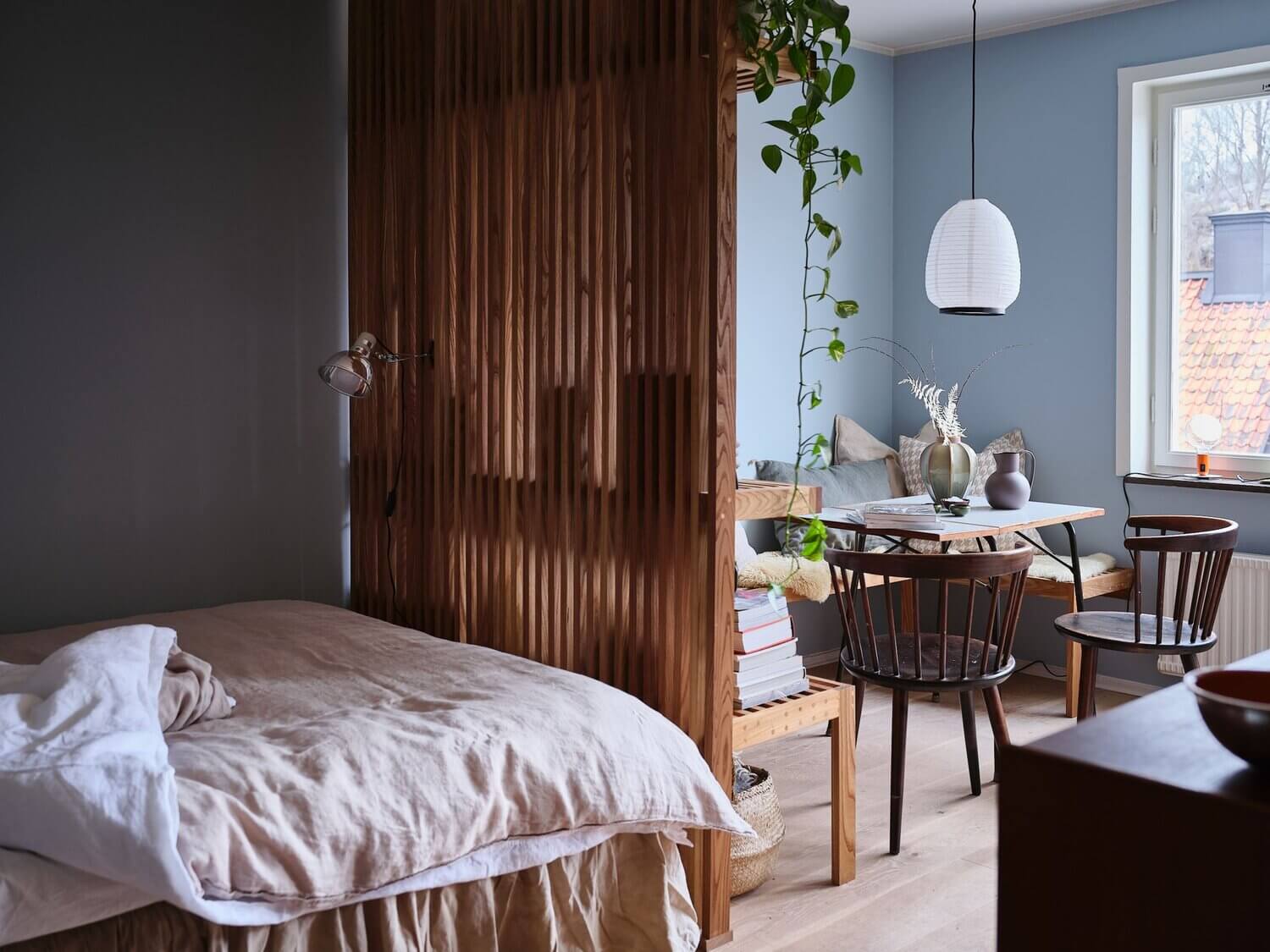 43 Ideas To Divide a Studio Apartment Into Multiple Rooms 47 tiny blue studio apartment nordroom 43 Ideas To Divide a Studio Apartment Into Multiple Rooms