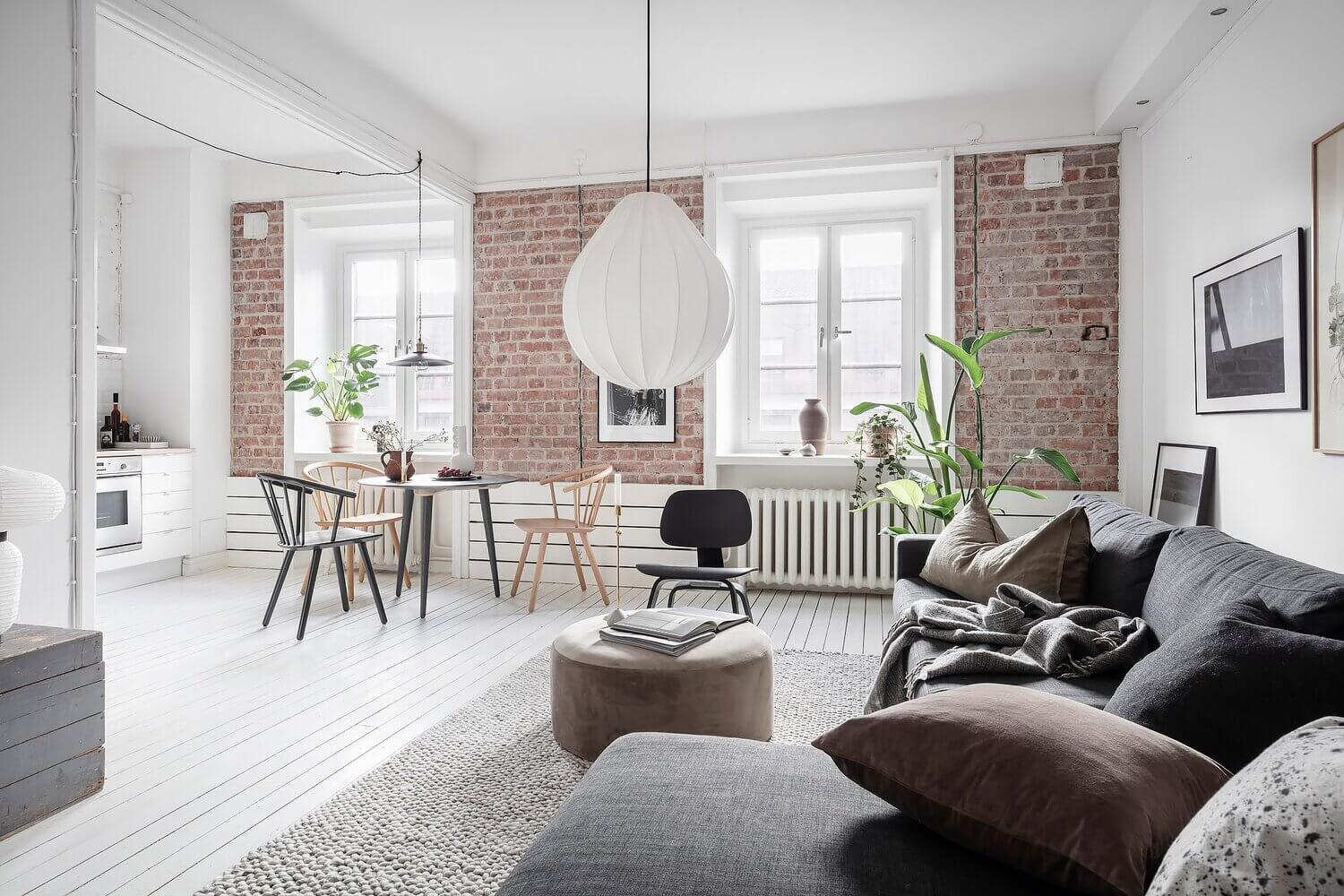 A Bright Scandinavian Apartment with Exposed Brick Walls 1 bright scandinavian apartment exposed brick walls nordroom A Bright Scandinavian Apartment with Exposed Brick Walls