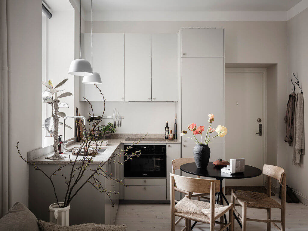 A Tiny Studio Apartment With A Storage-Filled Bed Nook 6 ATinyStudioApartmentWithAStorage FilledBedNook TheNordroom5 A Tiny Studio Apartment With A Storage-Filled Bed Nook