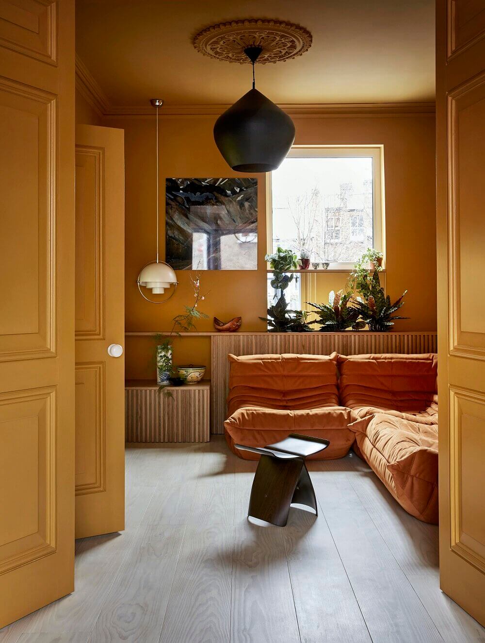 The Top Home Design Trends for 2026: Bold Color, Cozy Corners & Climate-Ready Living 1 golden-yellow-living-room-walls-ceiling-color-trends-nordroom