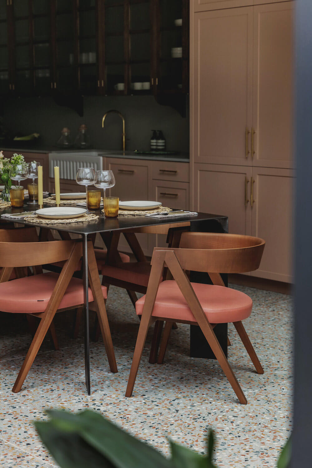Warm Colors and Texture In A North London Family Home 7 pink-kitchen-terrazzo-floor-midcentury-dining-chair-london-studio-duggan-nordroom