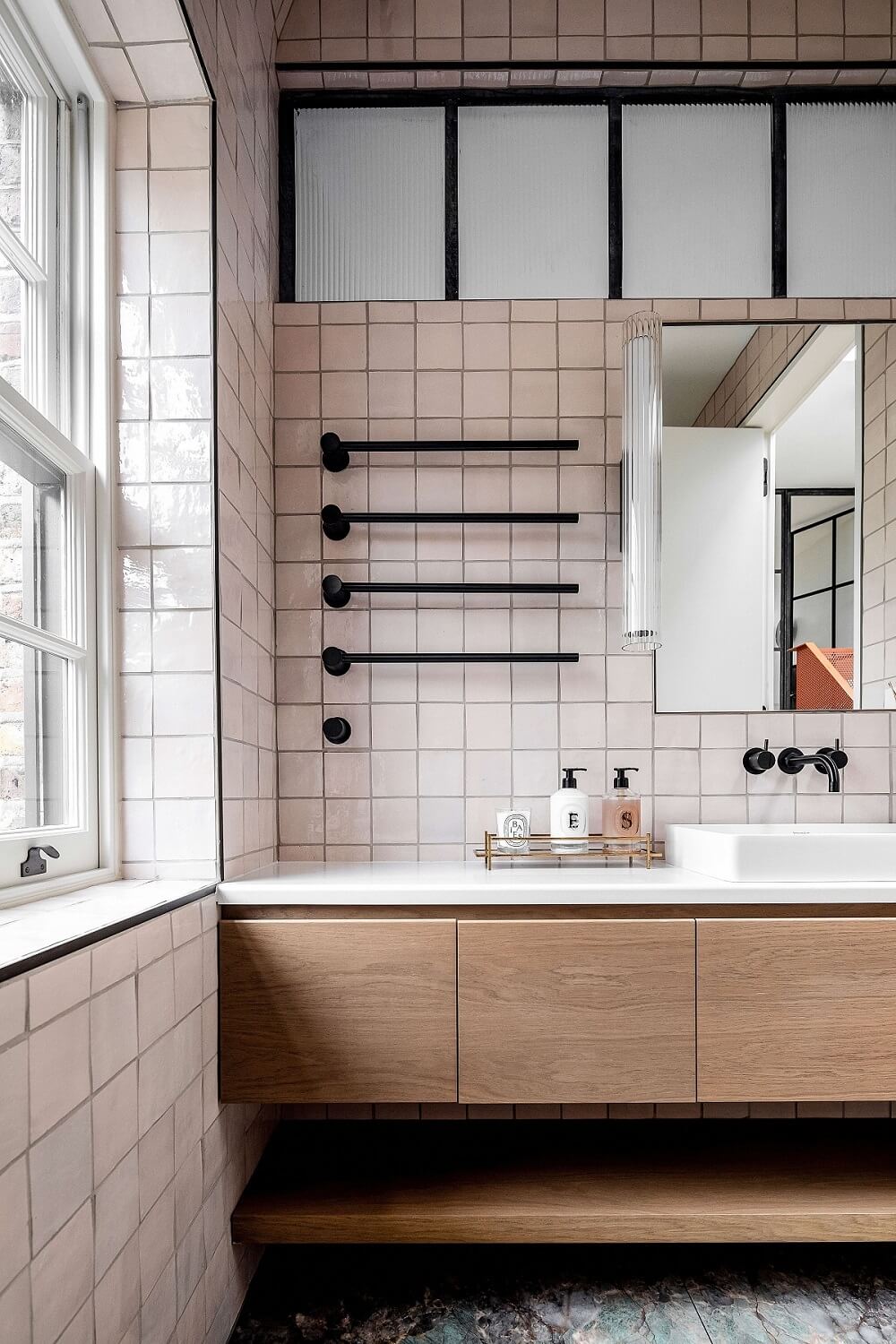 A Modern Playful Mews House in London 11 bathroom-pink-tiles-mews-house-nordroom