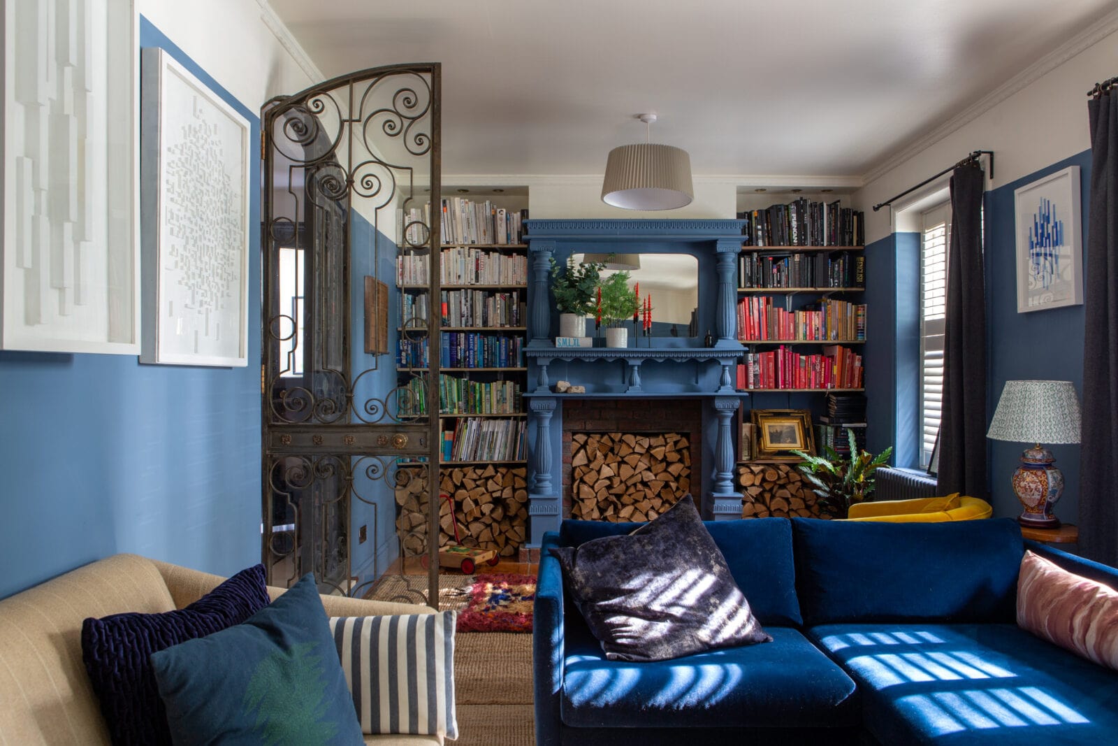 blue-living-room-fireplace-bookshelves-nordroom