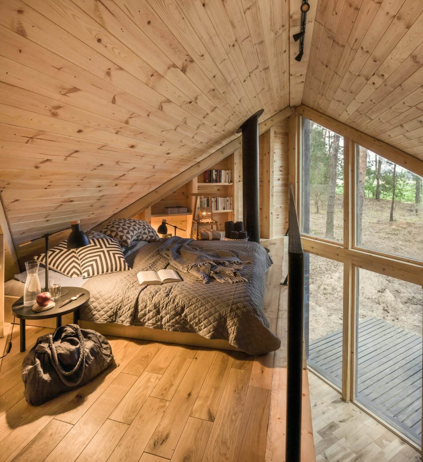 Best of 2021: Studio & Loft Apartments 14 loft-bedroom-bookshelves-cabin-poland-nordroom