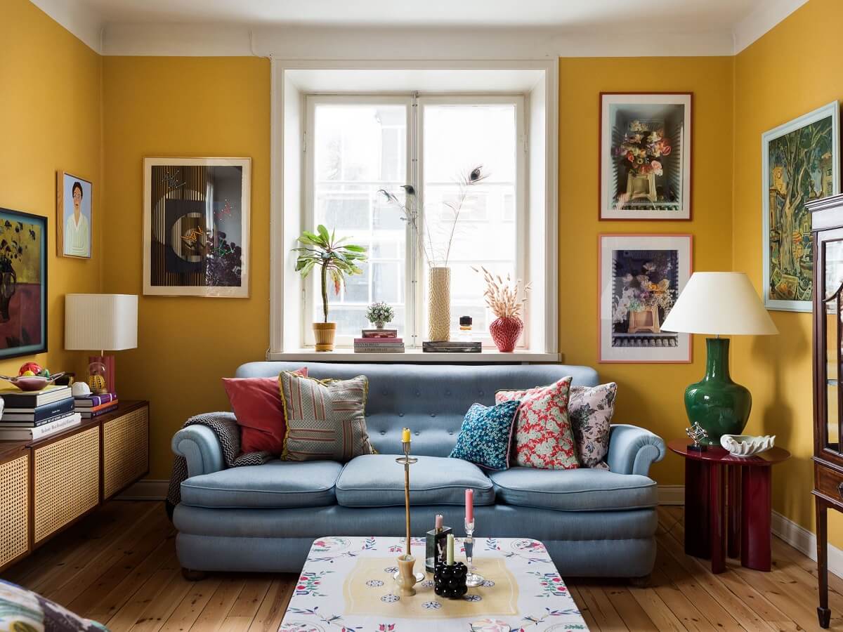 A Vibrant Colorful Scandinavian Apartment 3 blue-vintage-sofa-colorful-apartment-nordroom