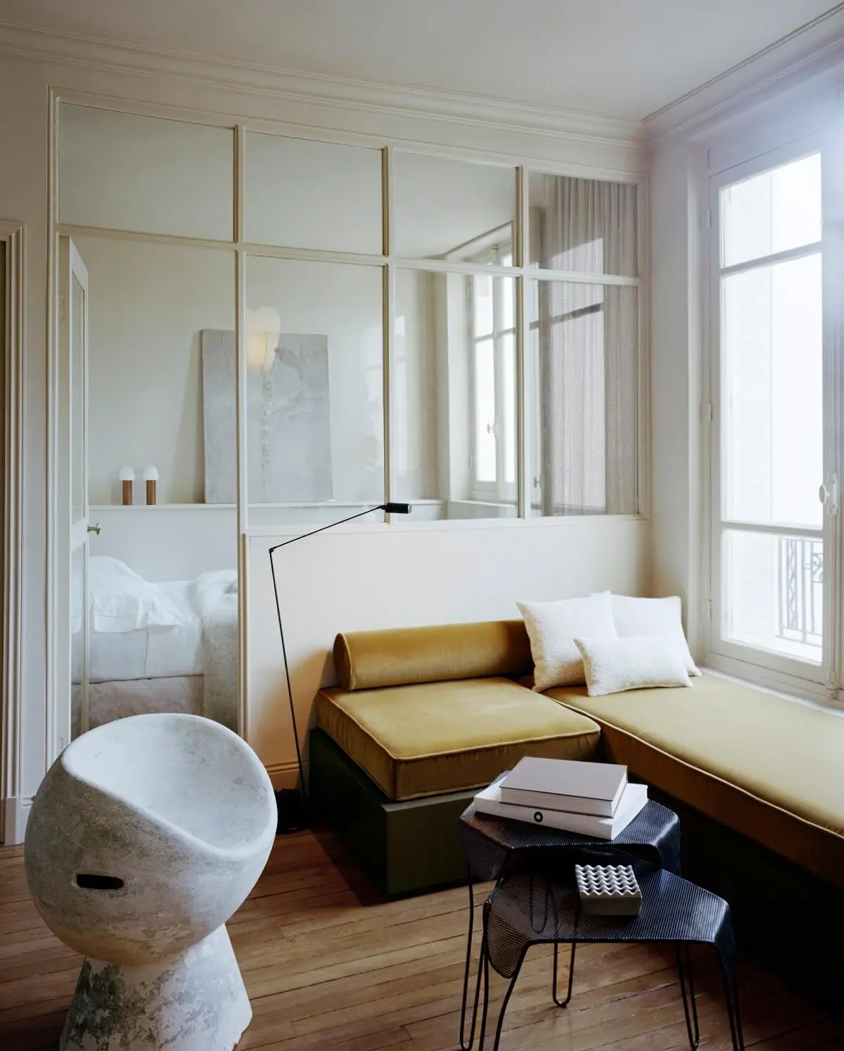 A Tiny Pied-à-Terre in Paris by Corpus Studio 1 living-area-custom-seating-glass-partition-wall-pied-a-terre-paris-corpus-studio-nordroom