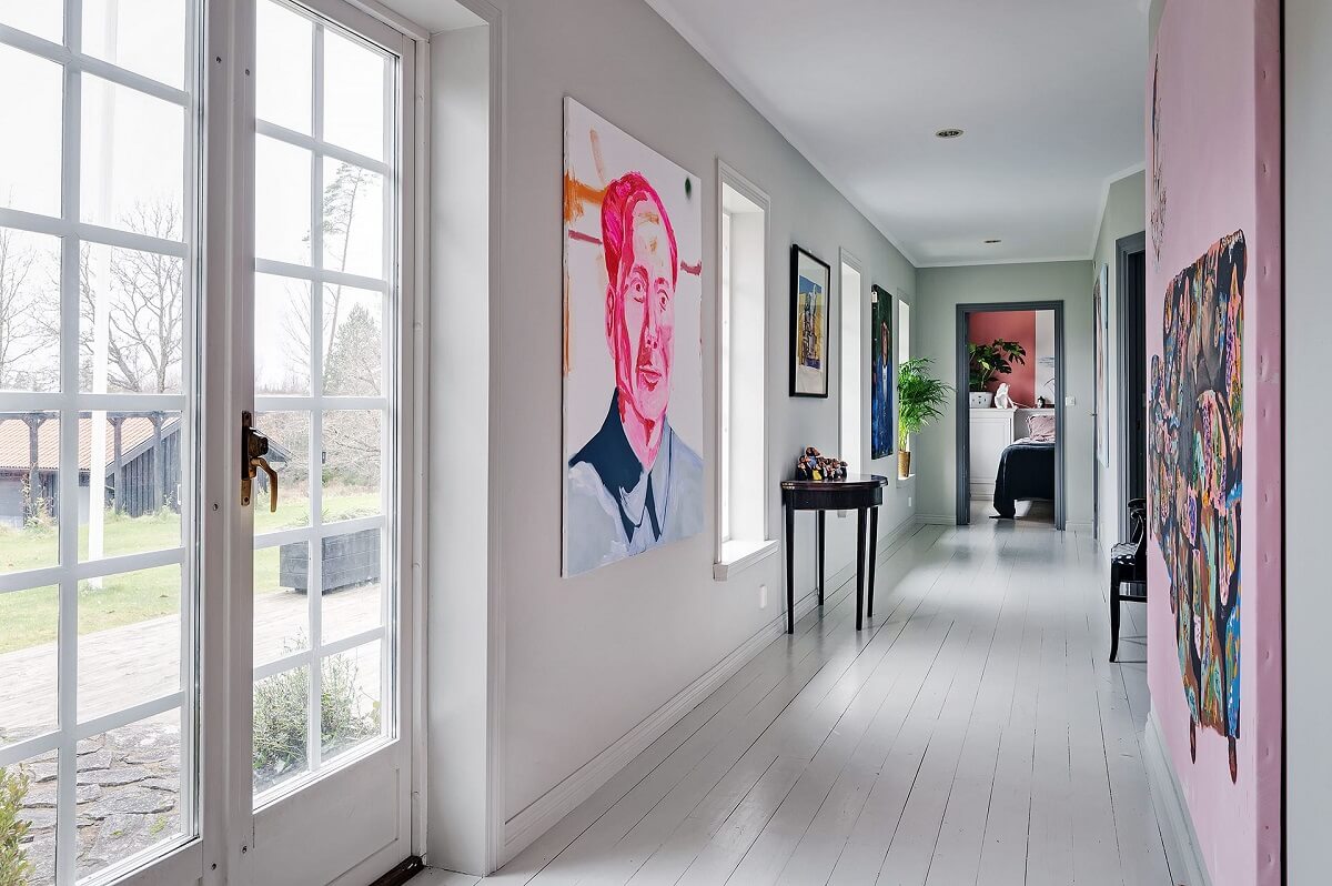 The Colorful Home of Artist Bobo Wallmansson 25 white-hallway-large-art-nordroom