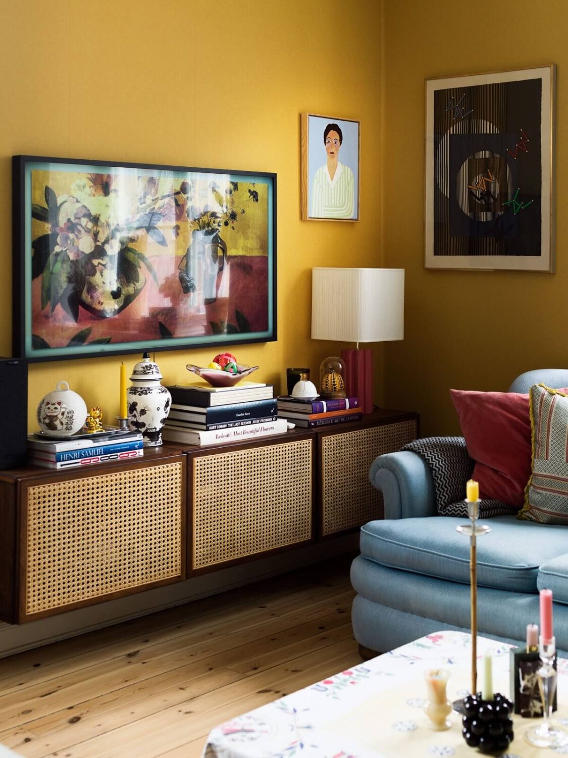 A Vibrant Colorful Scandinavian Apartment 4 yellow-living-room-television-midcentury-cabinet-nordroom