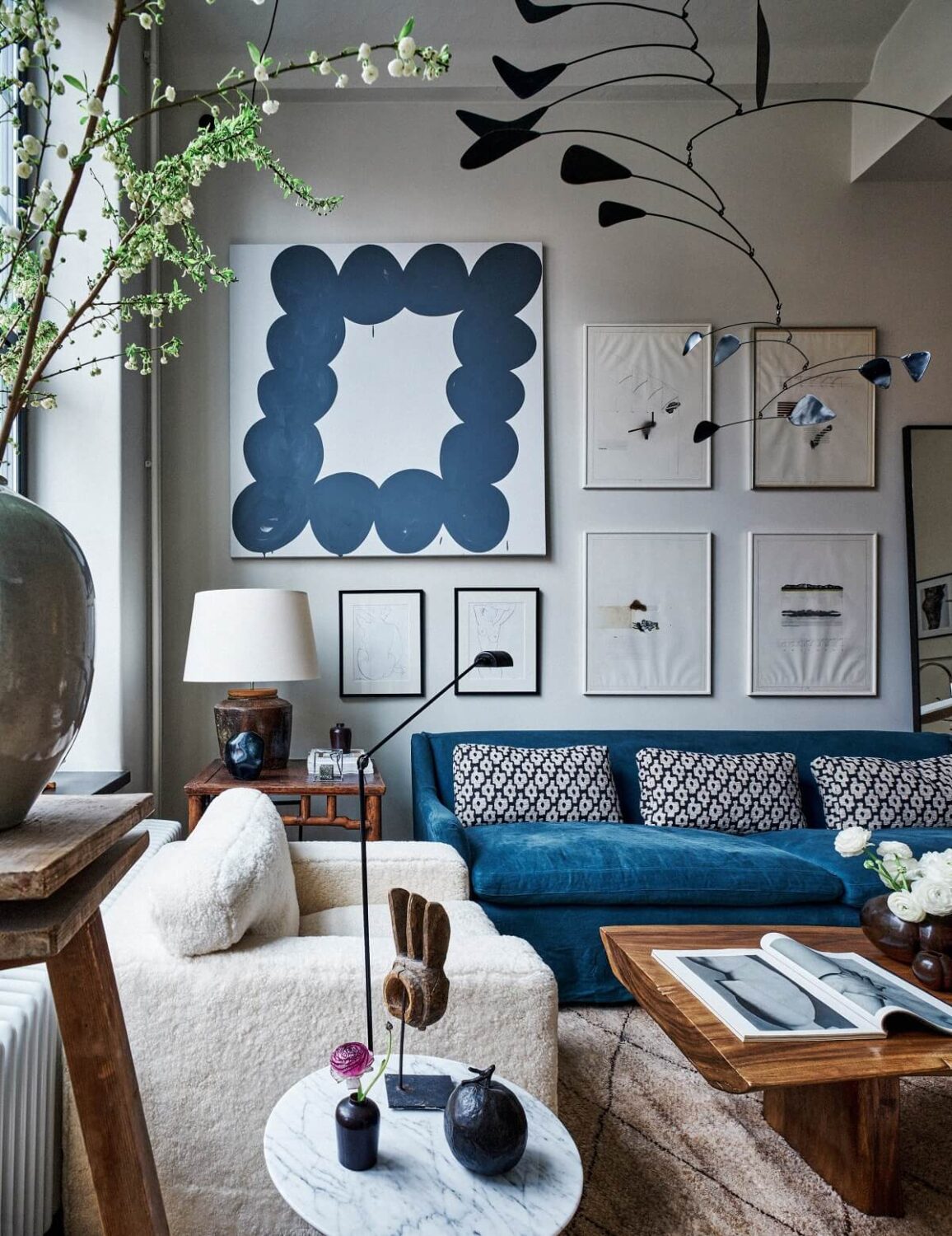 Best of 2021: Living Rooms 8 living-room-high-ceilings-art-blue-sofa-scandinavian-design-nordroom