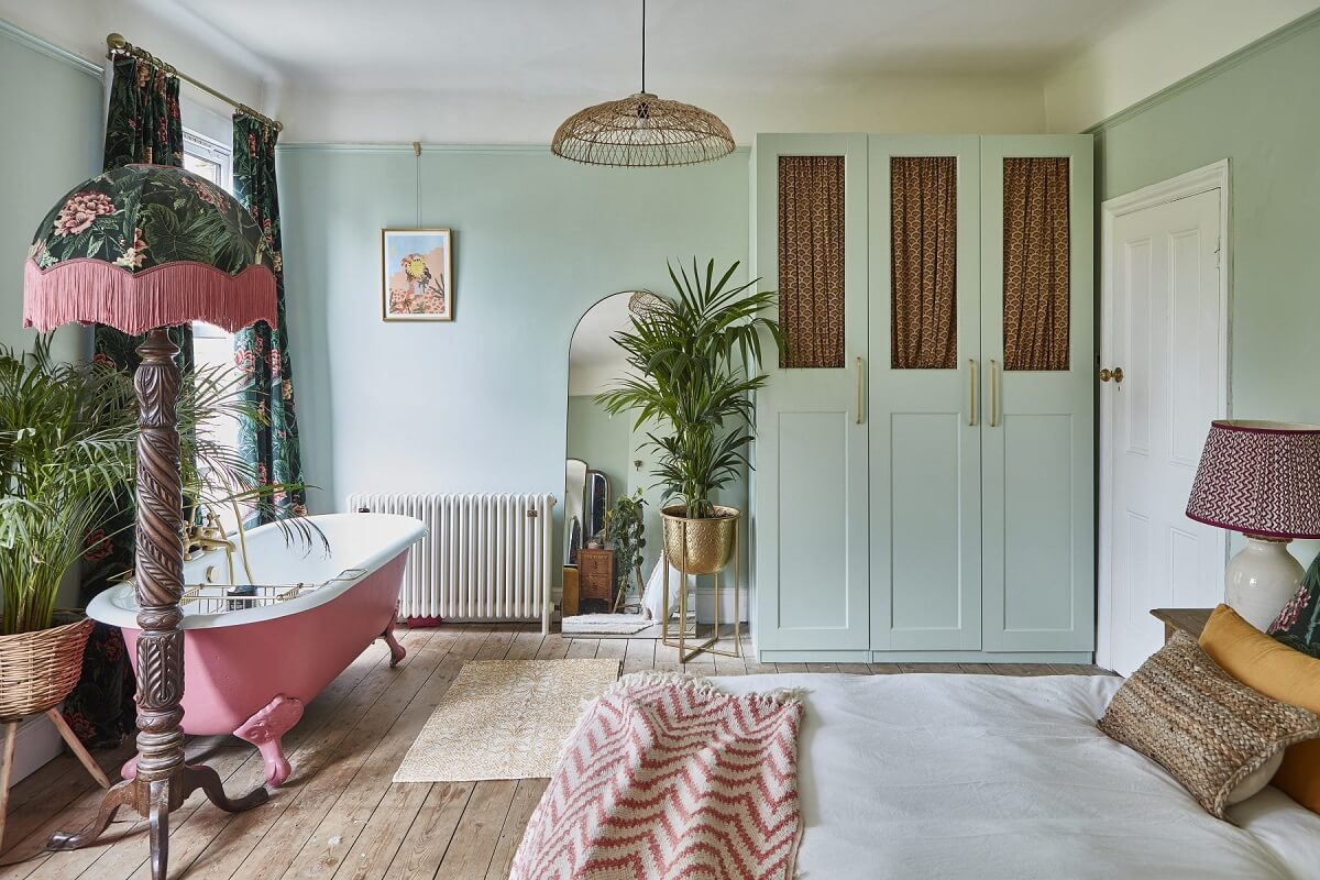 A Colorful 70s Inspired Home in London 20 master-bedroom-pink-bath-built-in-wardrobes-light-blue-nordroom