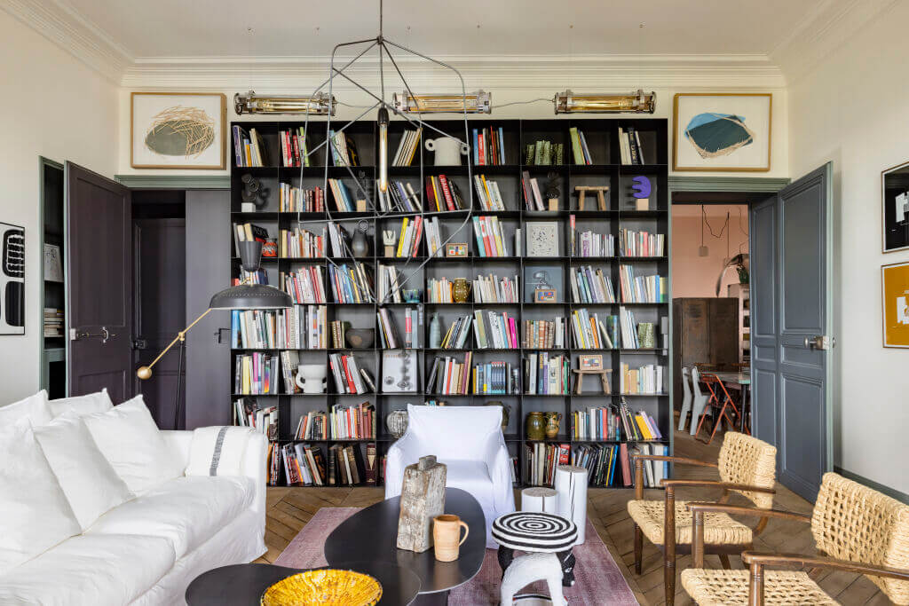 A Colorful Eclectic Apartment by Merci Paris 1 merci-paris-eclectic-apartment-living-room-bookshelves-nordroom
