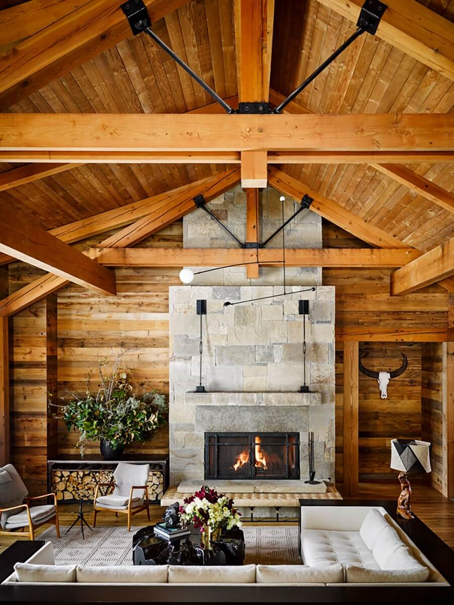 A Rustic Mountain Home in Big Sky, Montana 1 wooden-living-room-concrete-fireplace-nordroom