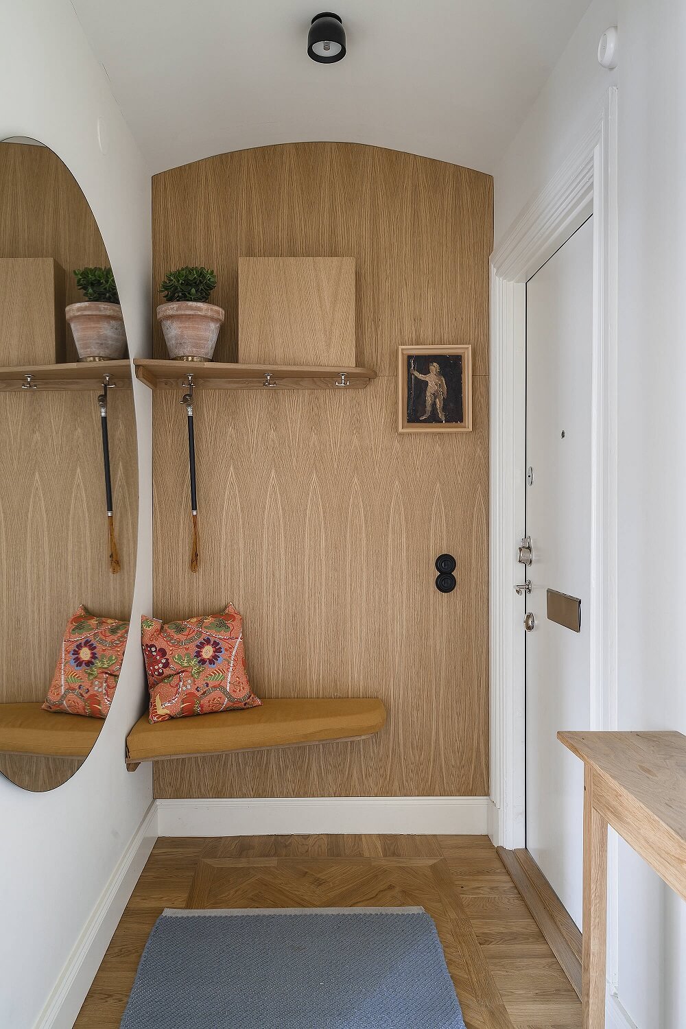 A Stylish Scandi Home with Oak Kitchen 23 oak-hallway-seat-round-mirror-nordroom