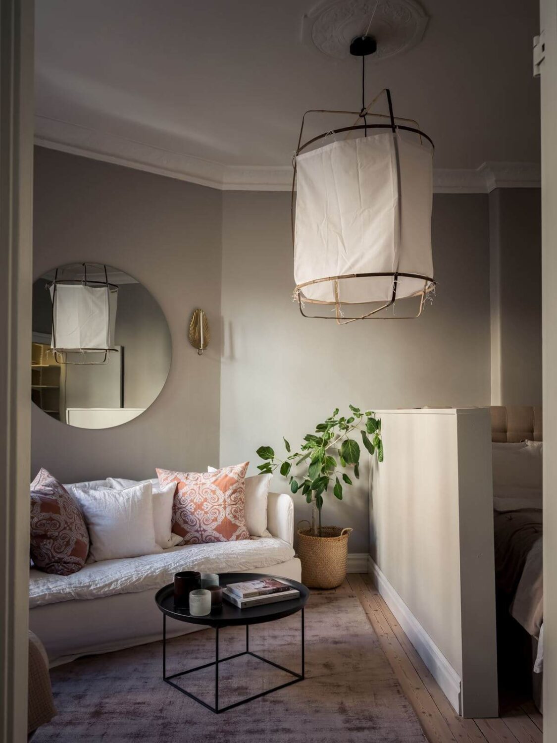 How To Decorate A Studio Apartment 33 gray-scandinavian-studio-apartment-round-mirror-nordroom