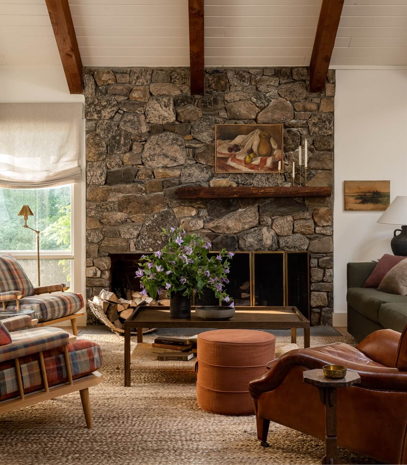 A Warm Country House in Dutchess County 1 Heidi-Caillier-Design-CT-country-house-Dutchess-County-design-living-room-stone-fireplace-beams-jute-rug-Nordroom