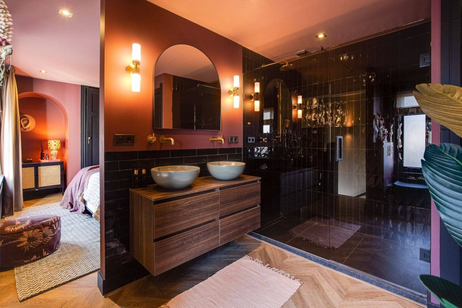 A Dutch Family Home with Warm Color Accents 16 bathroom-black-shower-tiles-terracotta-walls-nordroom