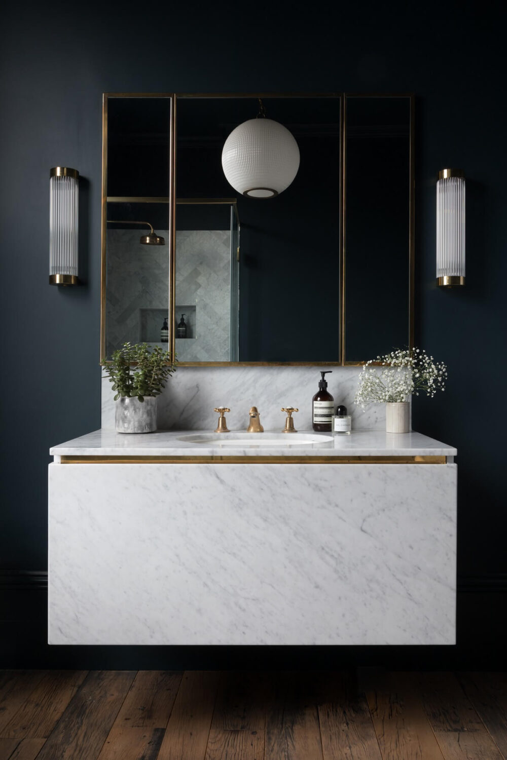 Contrasting Styles in a Victorian Home in London 24 bathroom-dark-blue-walls-white-vanity-wooden-floor-victorian-home-london-nordroom