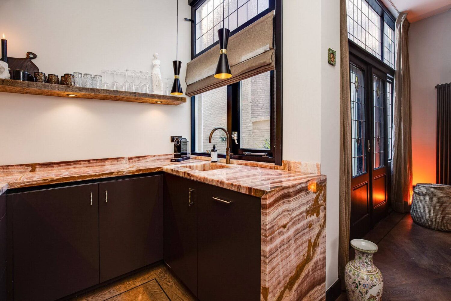 A Dutch Family Home with Warm Color Accents 11 black-kitchen-cabinets-onyx-marble-worktop-dutch-family-home-nordroom