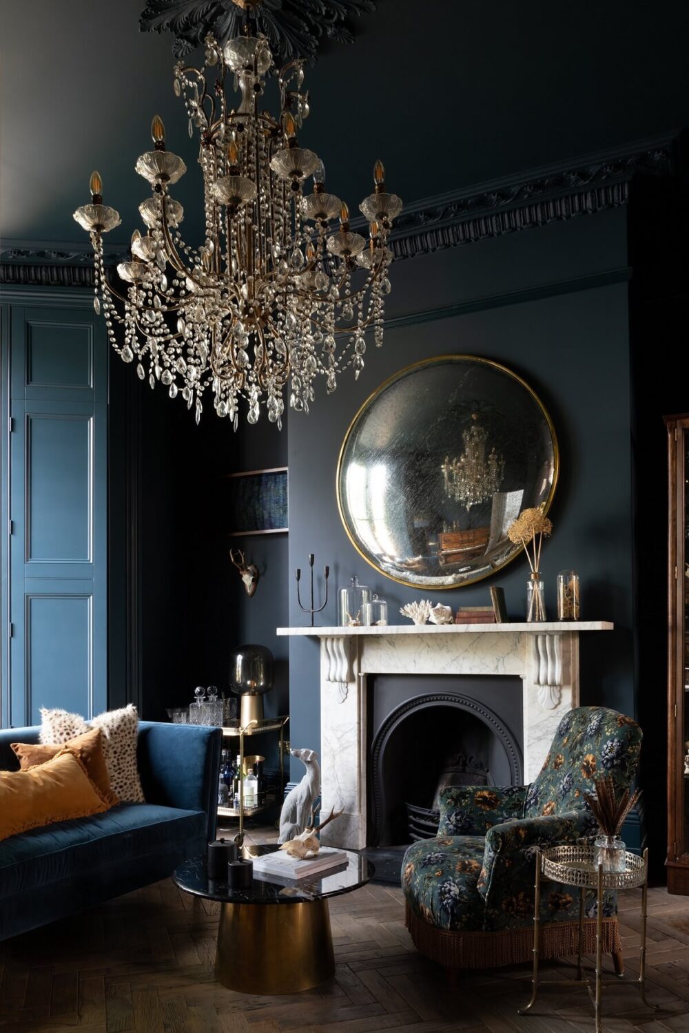 Contrasting Styles in a Victorian Home in London 6 dark-blue-victorian-sitting-room-fireplace-dark-blue-sofa-frank-and-faber-nordroom
