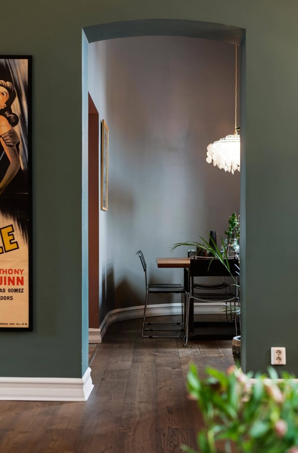 A Moody Family Home in Sweden 15 green-living-room-dining-room-nordroom