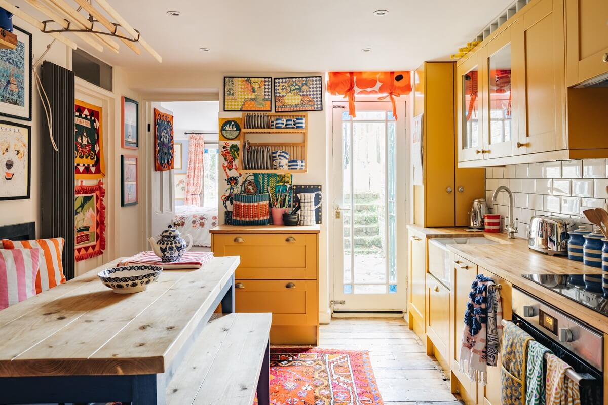 A Playful Maximalist Home in London 6 kitchen-yellow-cabinets-bench-india-yellow-farrow-ball-maximalist-decor-nordroom
