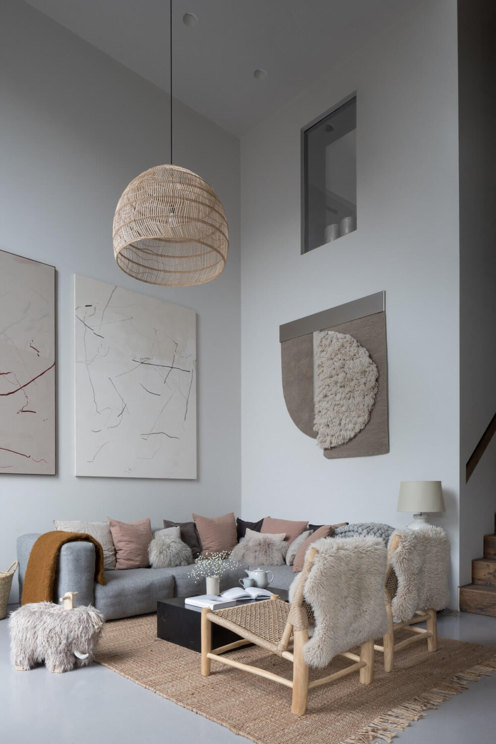 Contrasting Styles in a Victorian Home in London 11 light-double-height-sitting-room-contemporary-art-furnishings-victorian-home-london-frank-and-faber-nordroom