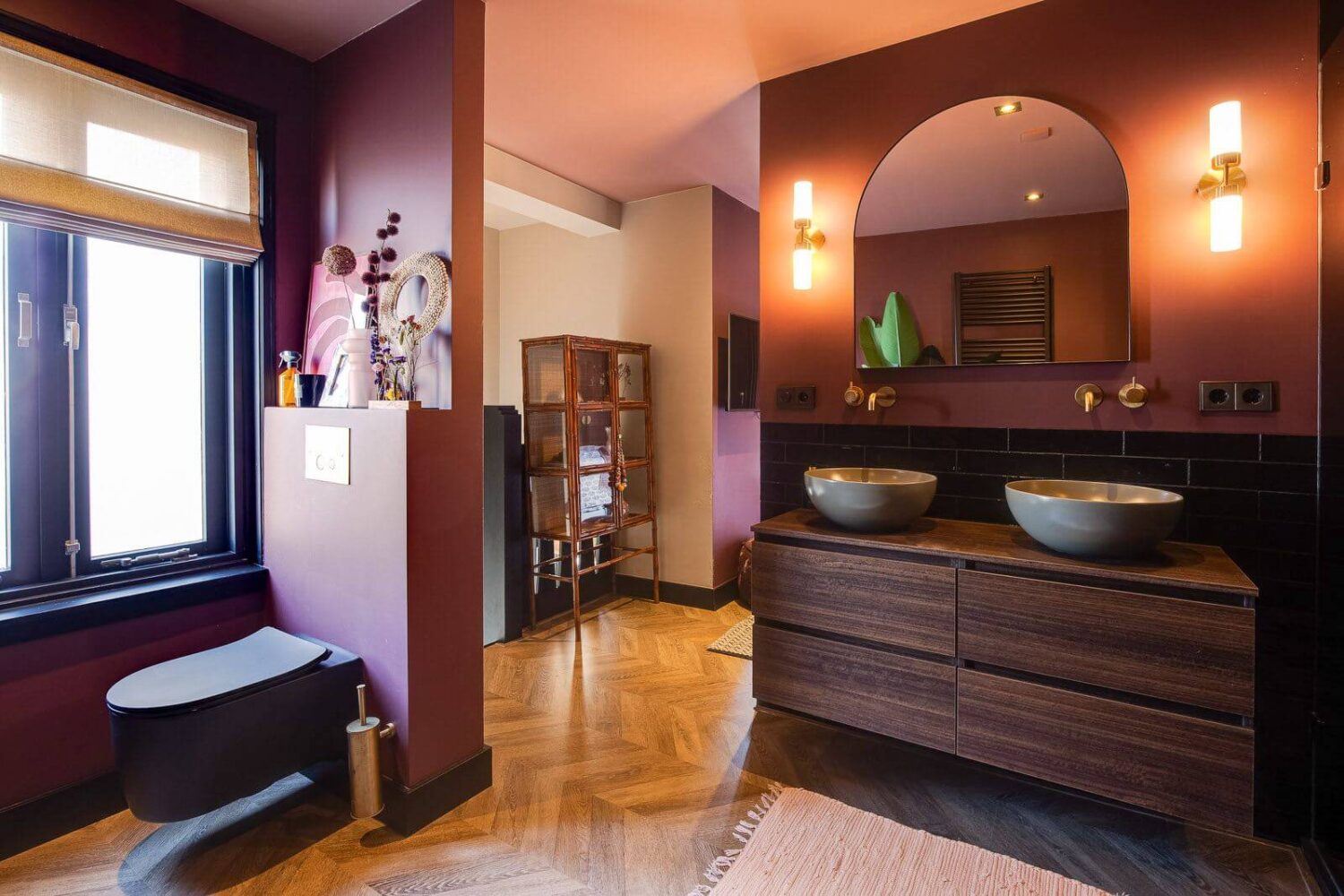 A Dutch Family Home with Warm Color Accents 15 master-bathroom-black-toilet-warm-terracotta-walls-nordroom