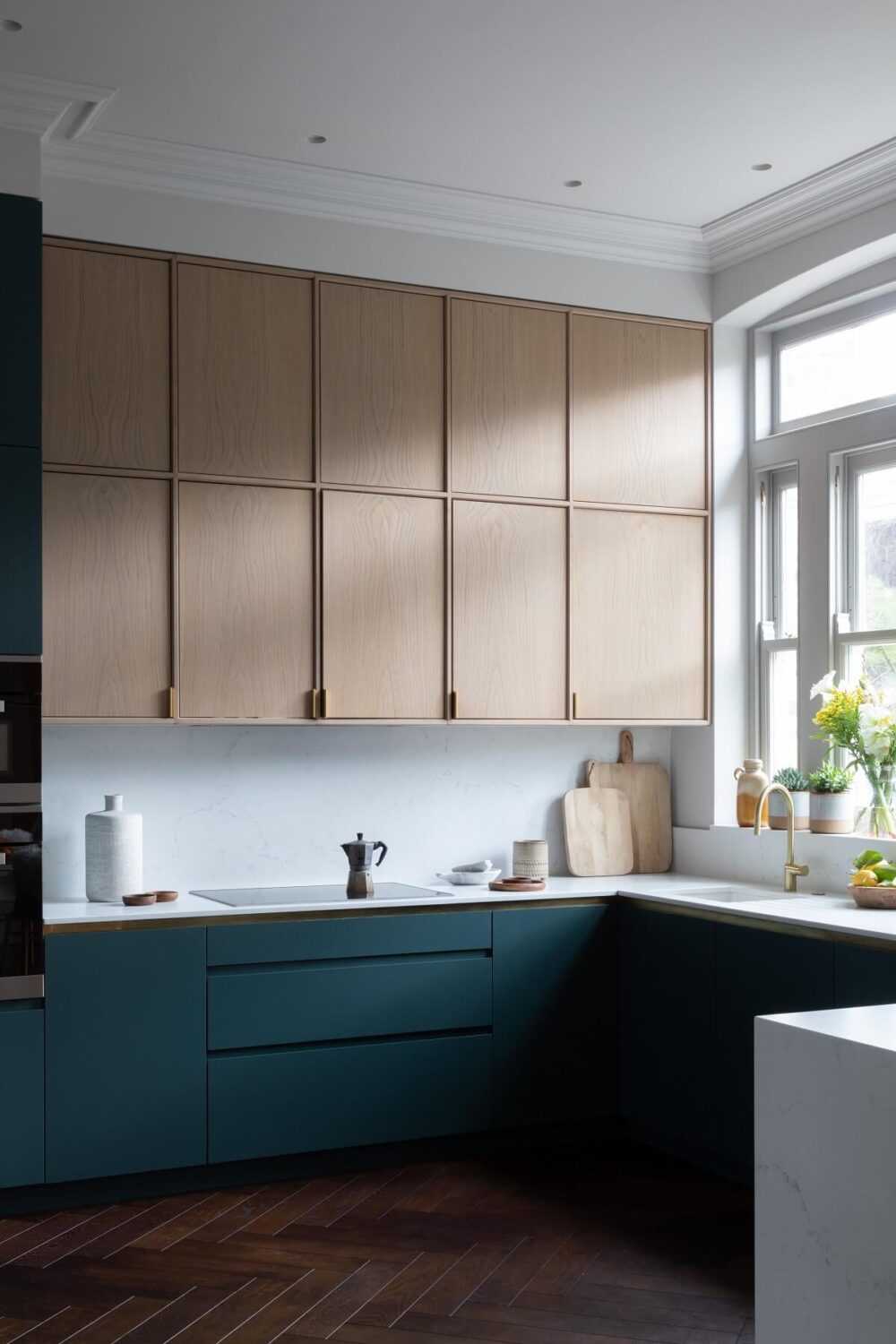Glidden & PPG Color of the Year 2023: Vining Ivy 23 modern-kitchen-blue-cabinets-wooden-upper-cabinets-london-townhouse-nordrom