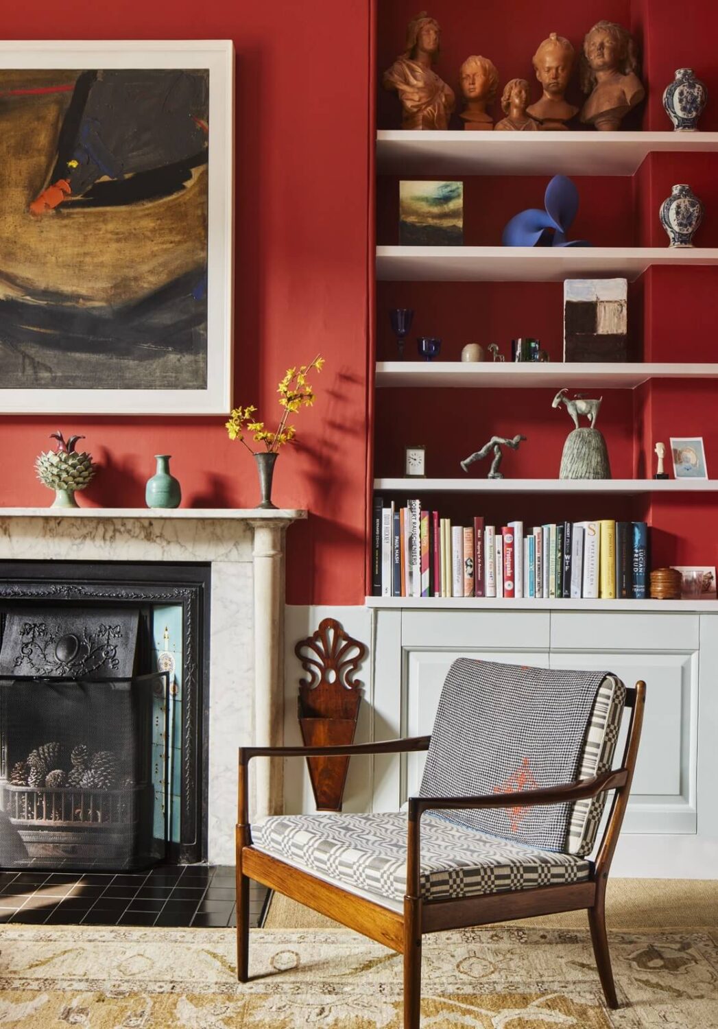 An Eclectic Art-Filled Townhouse in London 5 red-sitting-room-fireplace-shelves-nordroom