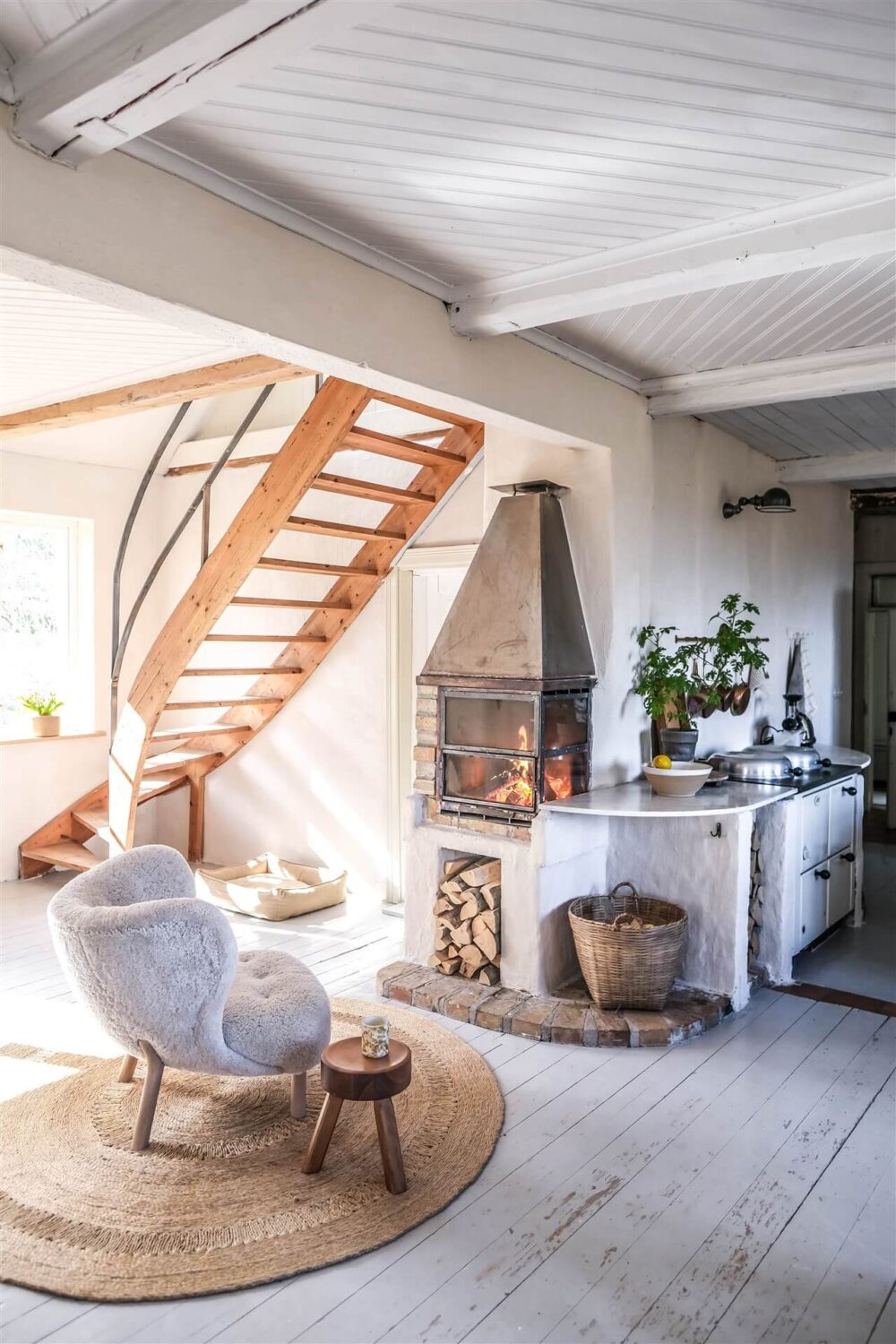 Our Food Stories' Countryside Cottage in Sweden 9 sitting-area-fireplace-country-home-nordroom
