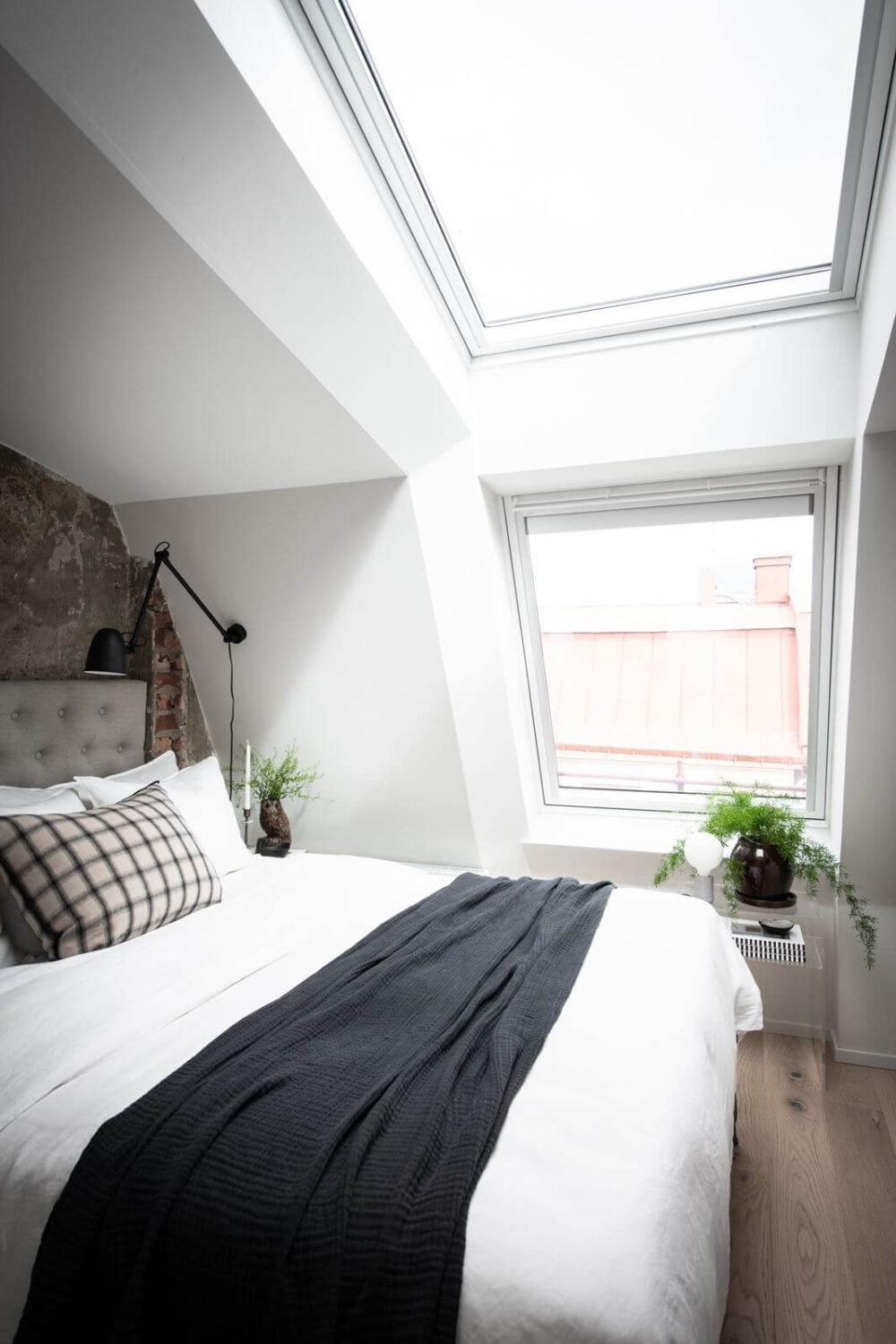 A Light Nordic Attic Loft with Raw Walls and Skylights 13 attic-bedroom-skylight-raw-wall-nordic-design-nordroom