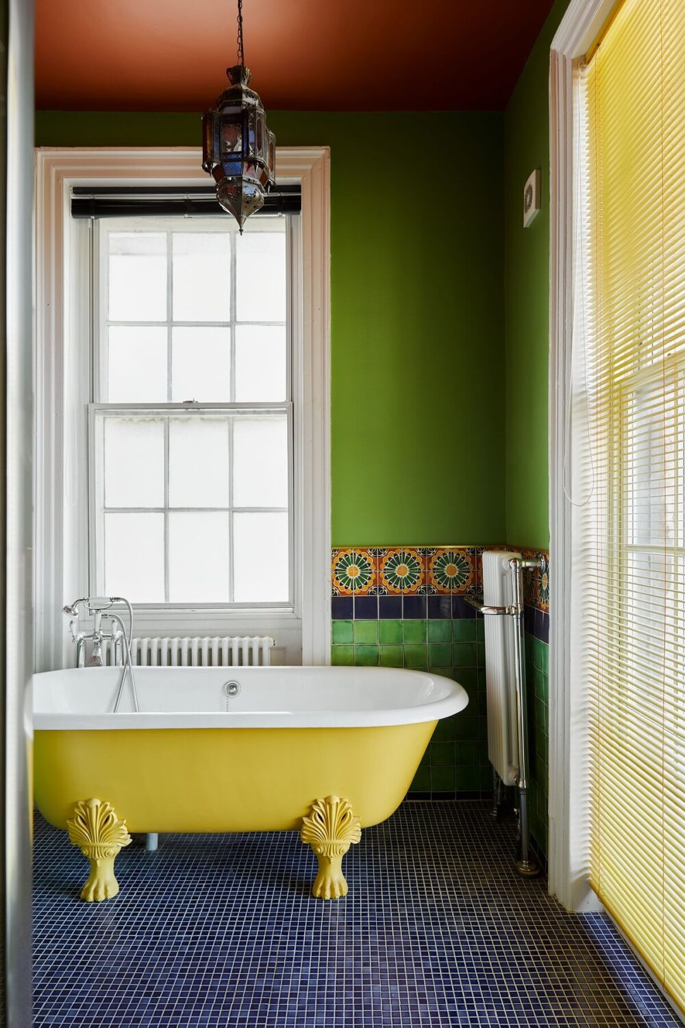A Colorful Eclectic Home in England 25 bathroom-green-walls-red-ceiling-yellow-clawfoot-bath-nordroom