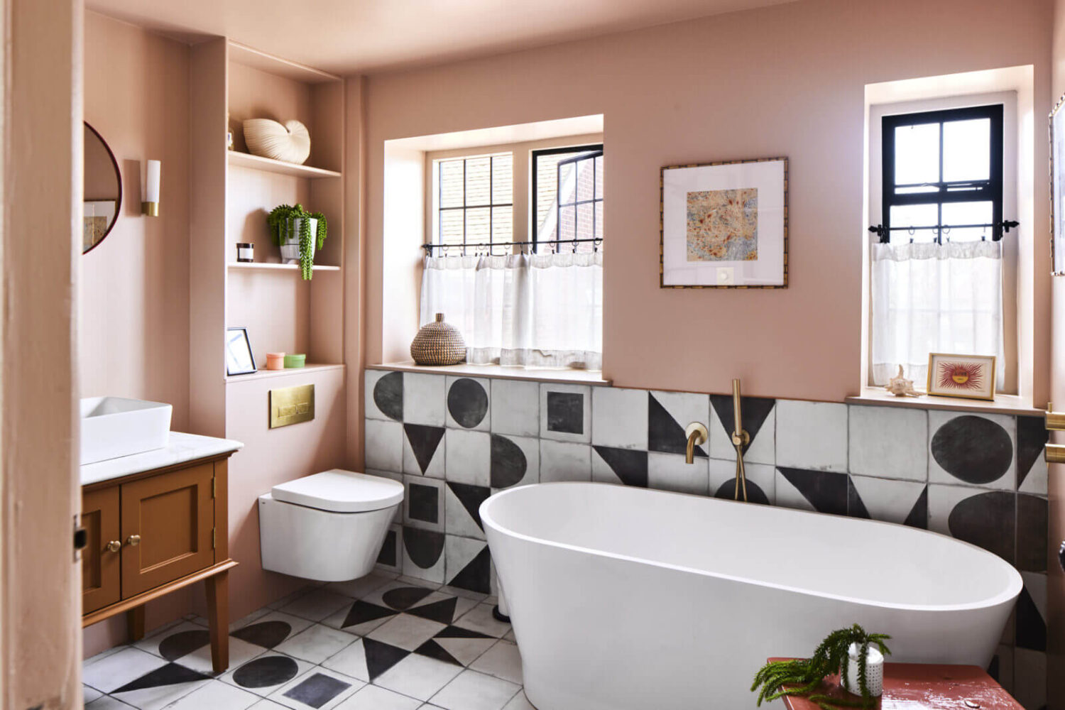 89 Pink Bathroom Ideas: From Hot Pink Walls to Blush Tiles 12 bathroom-pink-walls-freestanding-bath-black-white-geometric-tiles-nordroom