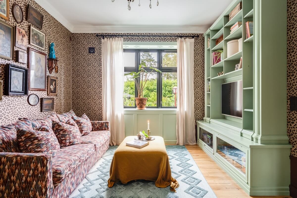 A Colorful Family Home in a Former School Building 1 colorful-eclectic-living-room-mint-green-tv-cabinet-panter-wallpaper-gallery-wall-nordroom