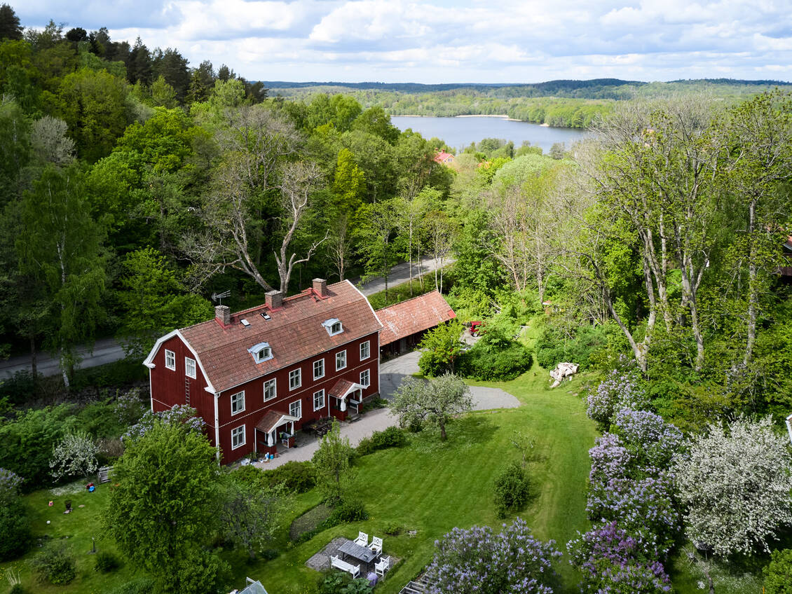 A Warm Countryside Family Home in Sweden 34 exterior red wooden house sweden garden nordroom A Warm Countryside Family Home in Sweden
