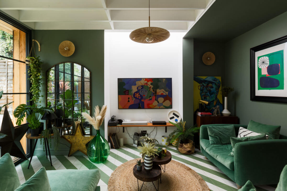 A Colorful Maximalist Home in London 18 green-sitting-room-velvet-armchair-green-white-floor-nordroom
