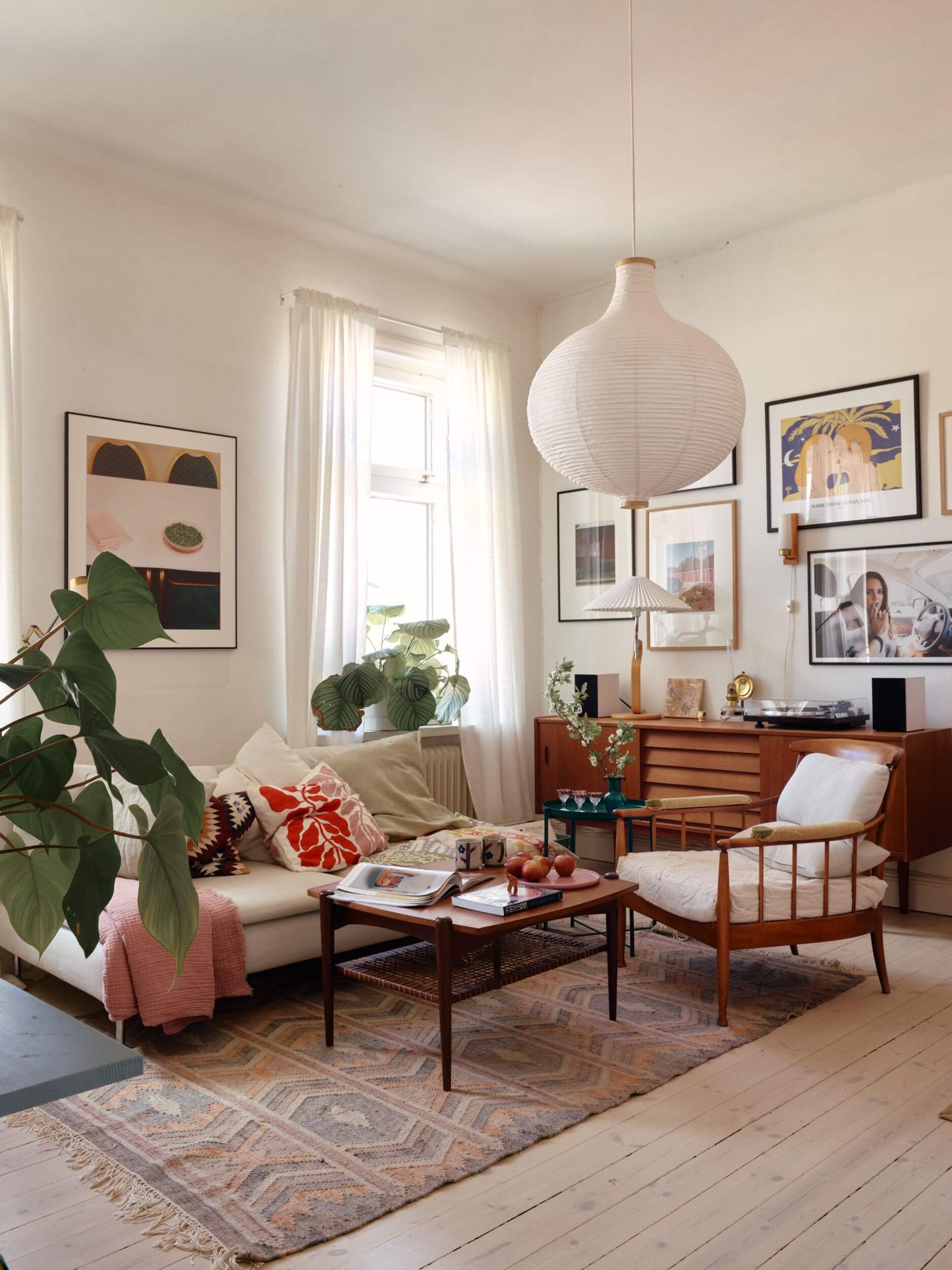 scandinavian-sitting-room-midcentury-gallery-wall-wooden-floor-nordroom