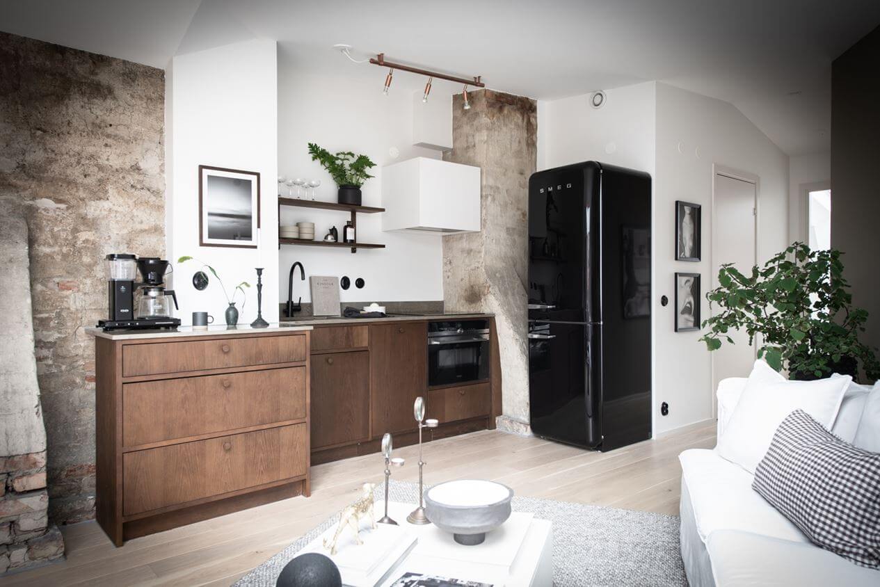 A Light Nordic Attic Loft with Raw Walls and Skylights 7 small-walnut-kitchen-exposed-brick-attic-apartment-scandinavian-design-nordroom