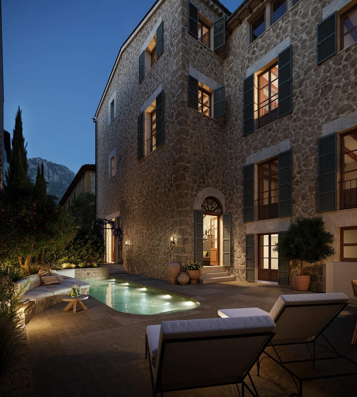 A Townhouse on Mallorca Combines Historic Charm and Modern Design 14 townhouse-mallorca-garden-exterior-night-nordroom