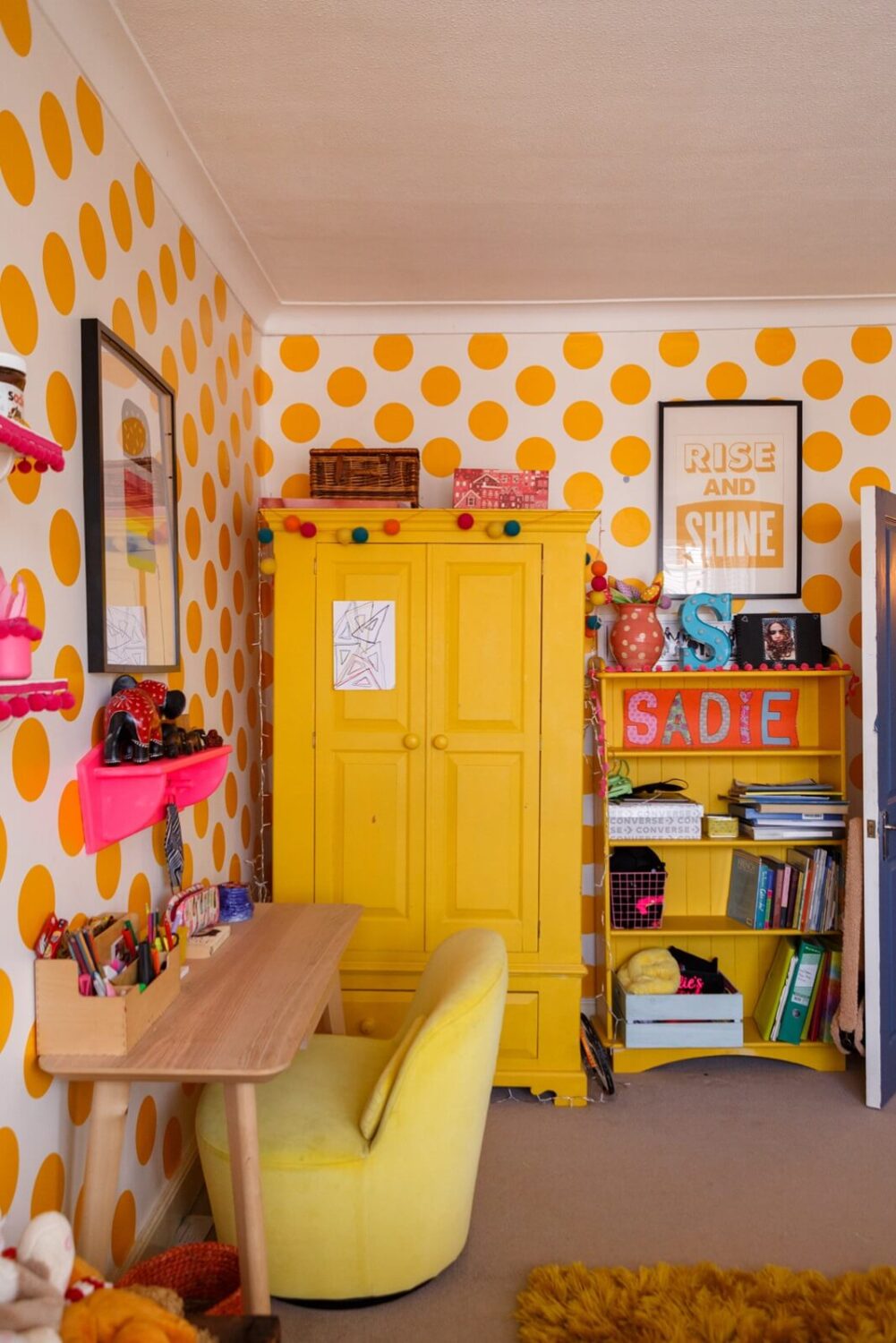 A Colorful Maximalist Home in London 35 yellow-kids-bedroom-polkadot-wallpaper-nordroom