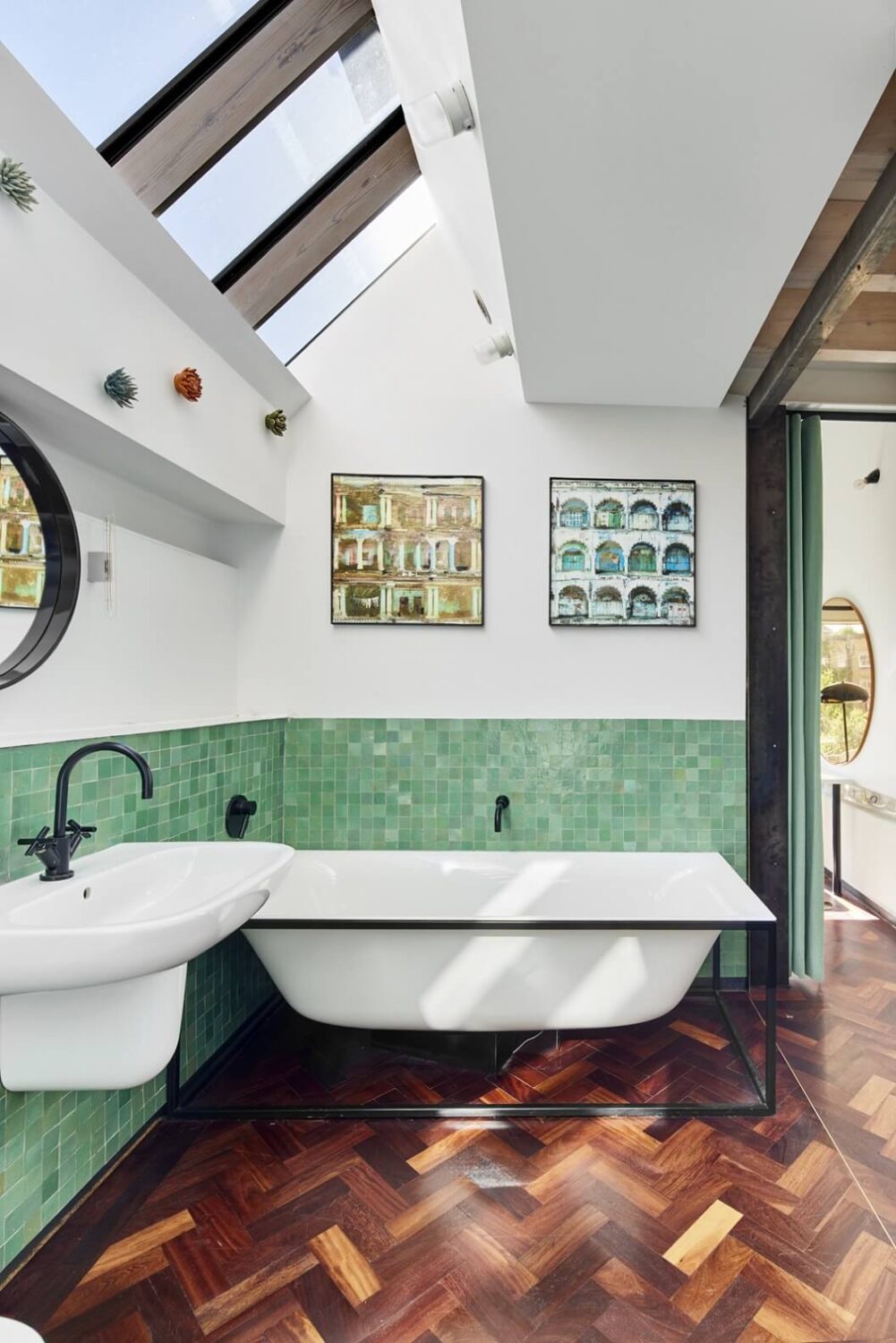 The Makers House: A Modern Achitectural Home in London 17 bathroom-reclaimed-mahogany-parquet-floor-green-tiles-bath-tub-skylights-nordroom