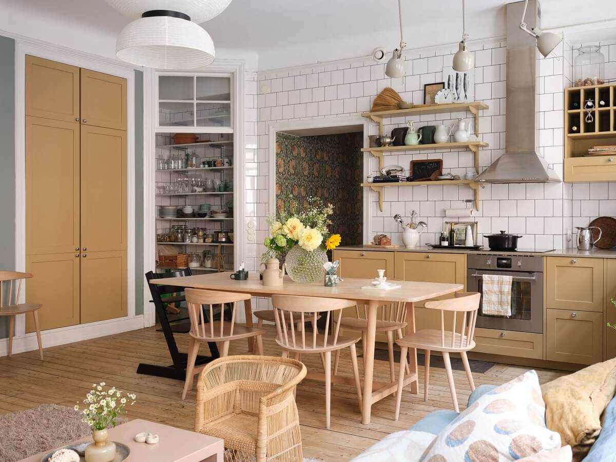 A Light Nordic Home with Ochre Yellow Kitchen 8 open-plan-kitchen-living-room-ochre-cabinets-wooden-floor-nordroom