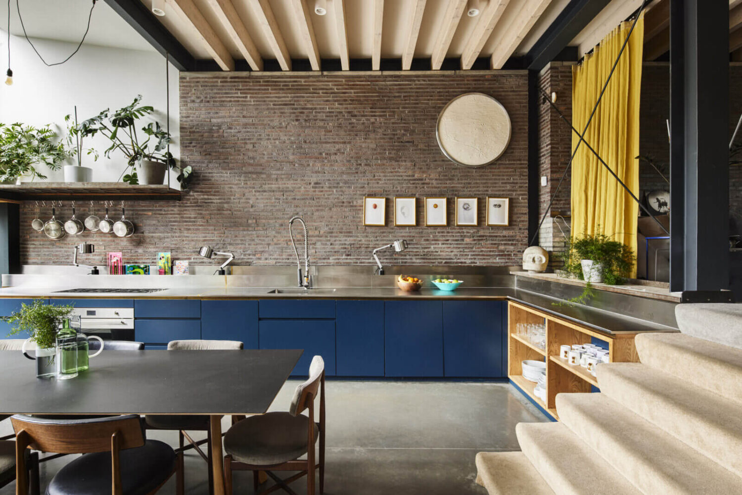 The Makers House: A Modern Achitectural Home in London 6 split-level-living-space-blue-kitchen-brick-wall-the-makers-house-london