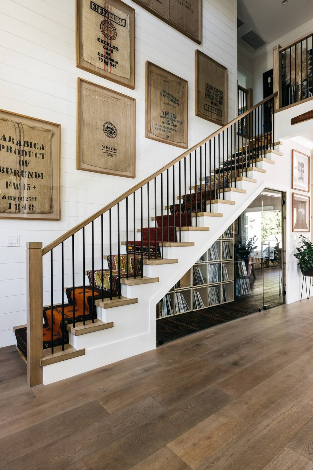 The Los Angeles Home of Emmy Raver-Lampman and Daveed Diggs 13 stairs-underneath-storage-music-collection-daveed-diggs-emmy-raver-lampman-nordroom