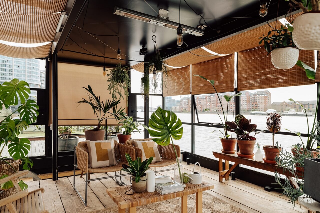 A Houseboat in London Fit For A Family 1 steel-glass-sitting-room-plants-nordroom